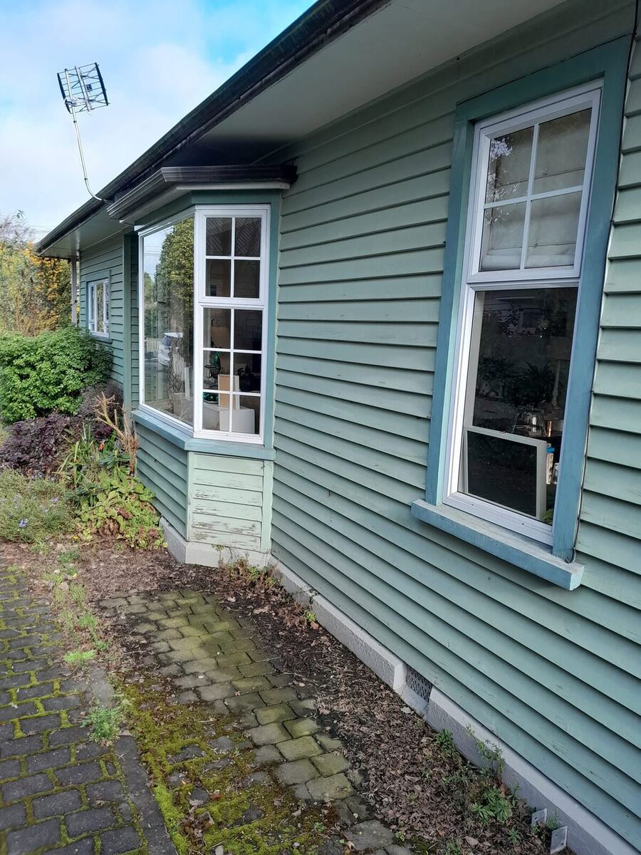 Side of house before repaint